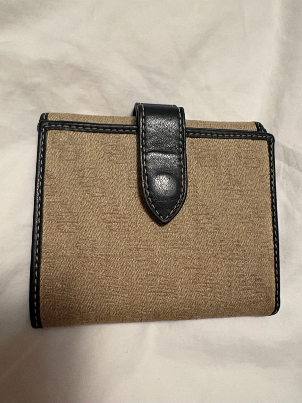 Dooney & Bourke Tan Wallet with Black Trim and Gold Hardware